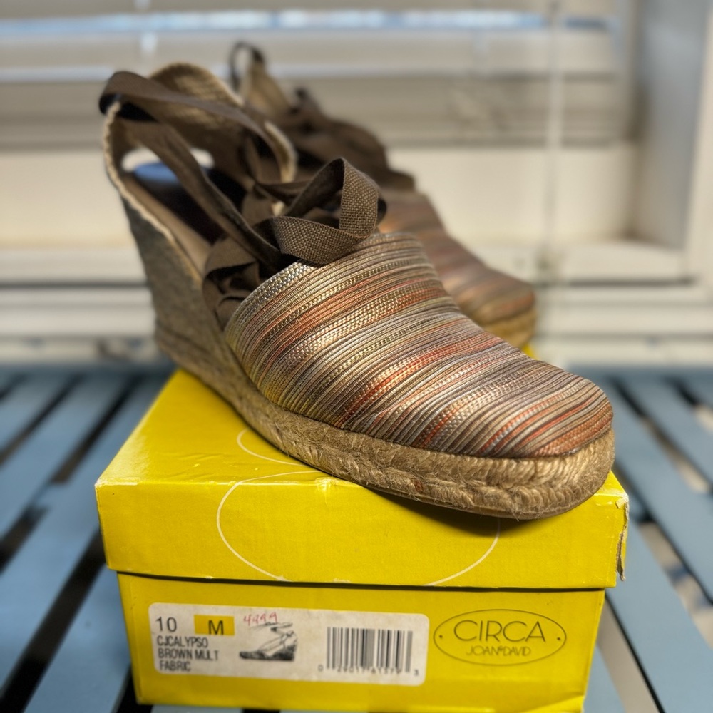 Used “ Calypso brown multi fabric” by Circa Joan and David.